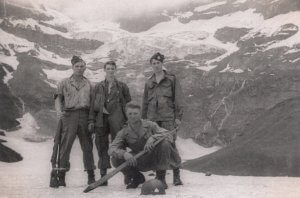 World War II Veteran of the 101st Airborne Division Jim "Pee Wee" Martin (center, top row) with his comrades in the Austrian Alps. 